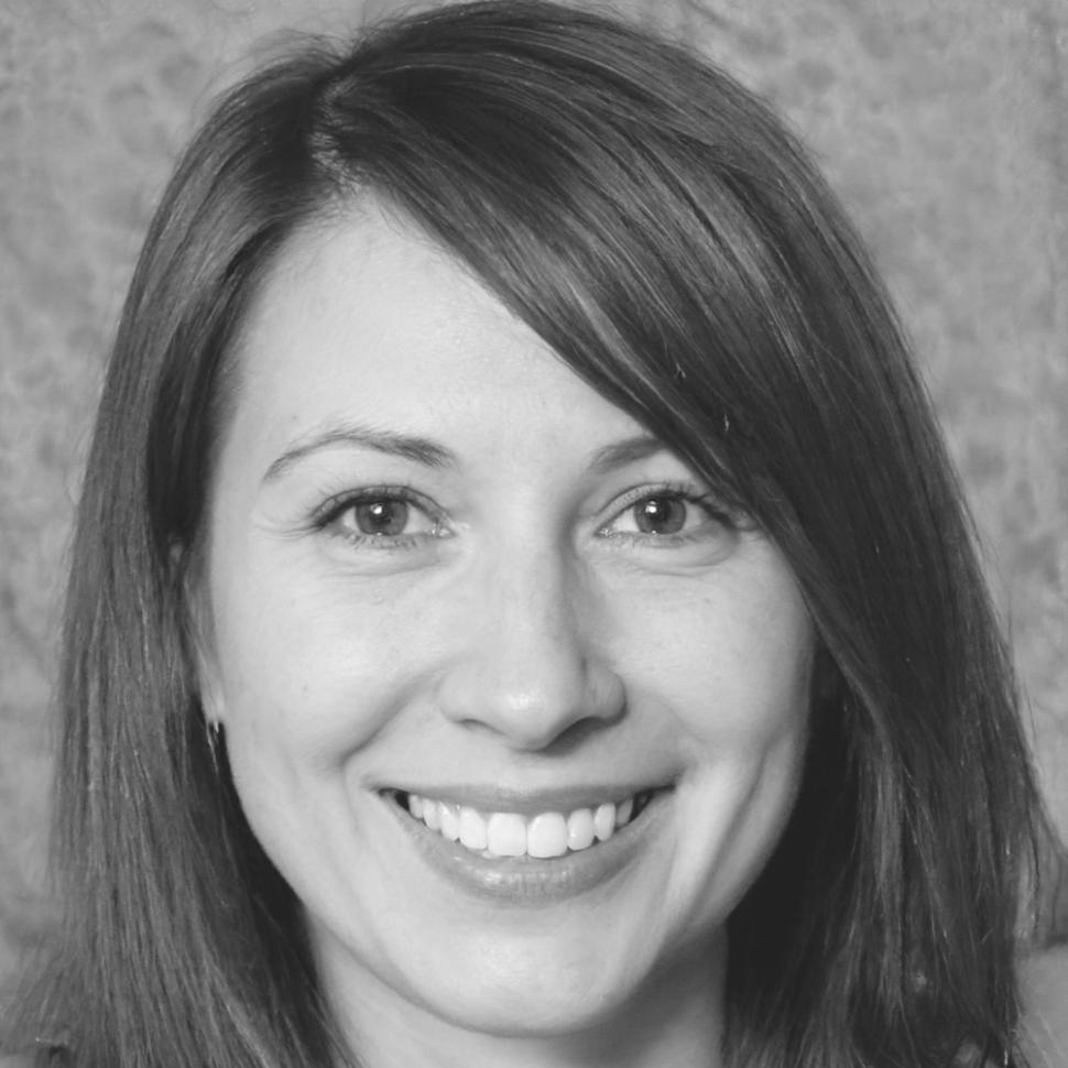 Insurance technology professional presenting blockchain solutions to corporate team