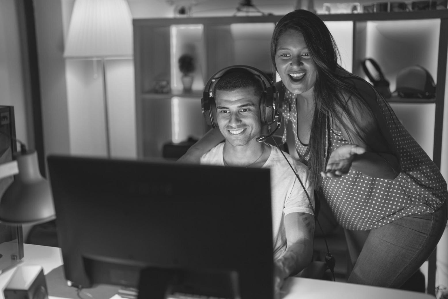 Students collaborating on blockchain insurance technology projects in modern learning environment